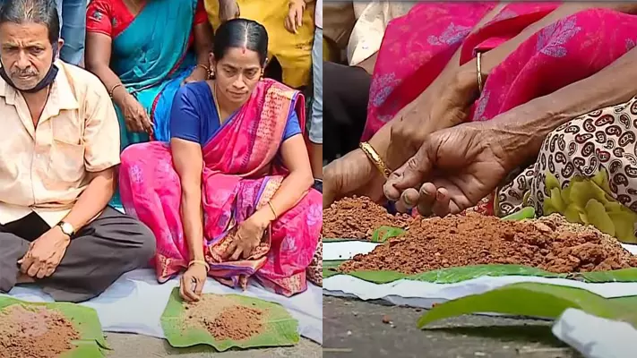 വിഷു ദിനത്തില്‍ മണ്ണ് വാരി തിന്ന് പിരിച്ചുവിട്ട ശുചീകരണ തൊഴിലാളികളുടെ പ്രതിഷേധം: സങ്കടകാഴ്ച