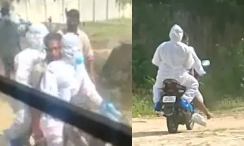 കോവിഡ് രോഗിക്ക് തുണയായി സന്നദ്ധ പ്രവർത്തകർ; ആശുപത്രിയിലെത്തിച്ചത് ബൈക്കിൽ