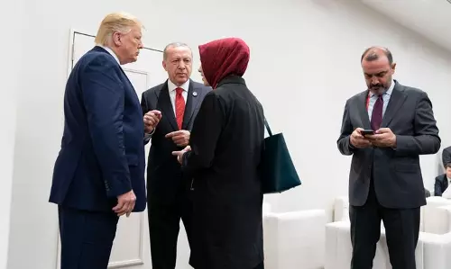 ഹിജാബ് ധരിച്ചതിന് അന്ന് നാടുകടത്തി,  ഇന്ന് ഉർദു​ഗാന്റെ പരിഭാഷകയായി മധുരപ്രതികാരം