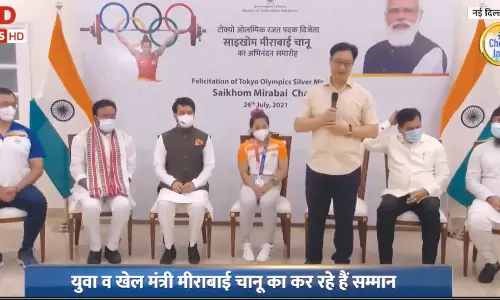 സ്വീകരണം മീരാഭായ് ചാനുവിന് ഫ്‌ളെക്‌സിൽ വലുത് മോദി; ചാനുവിന് നല്‍കിയ സ്വീകരണം വിവാദത്തില്‍