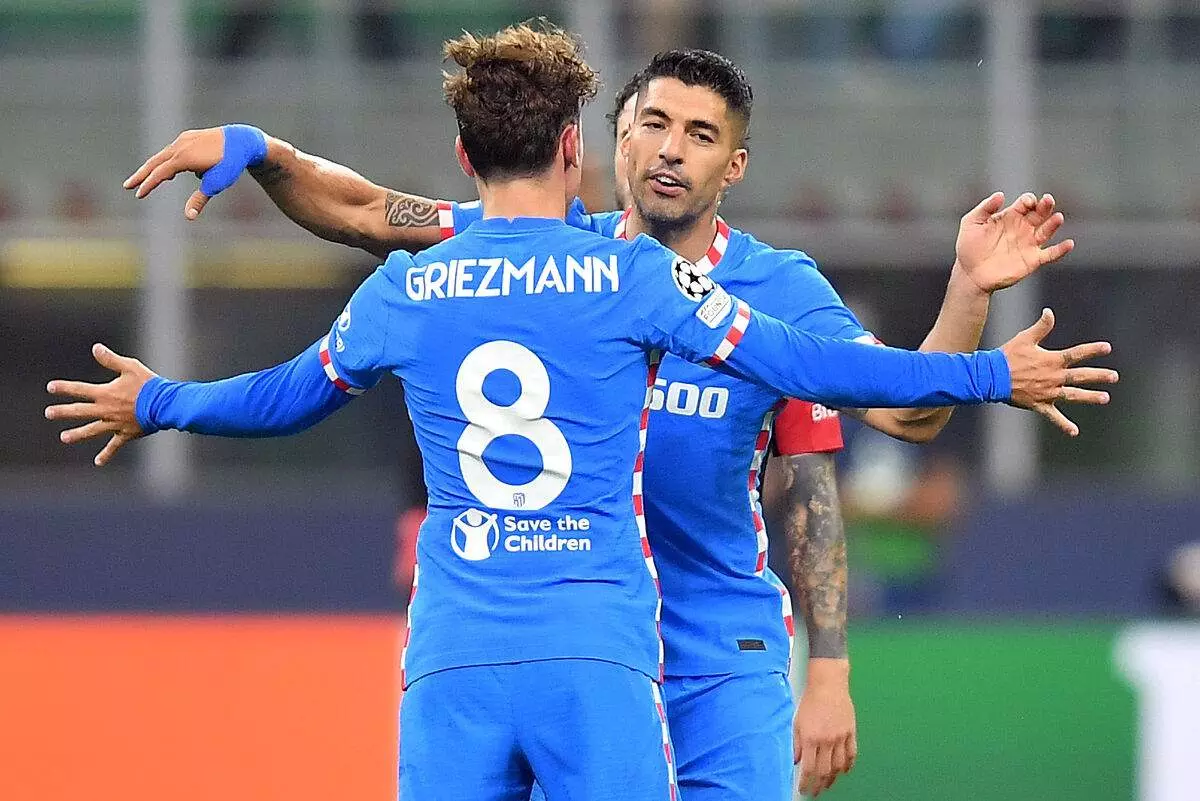 രക്ഷകരായി ഗ്രീസ്‍മാനും സുവാരസും; പത്ത് പേരായി ചുരുങ്ങിയ മിലാനെ അവസാന മിനുട്ടില്‍ കീഴടക്കി അത്‍ലറ്റിക്കോ