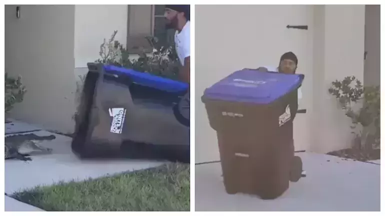 വീടിന് മുന്നില്‍ അപകടകാരിയായ മുതല, ചവുറ്റുകൊട്ടയിലാക്കി യുവാവ്; വീഡിയോ