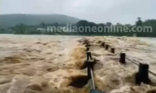 കോട്ടയത്ത് മൂന്ന് വീടുകൾ ഒലിച്ചുപോയി; 12 പേരെ കാണാതായി