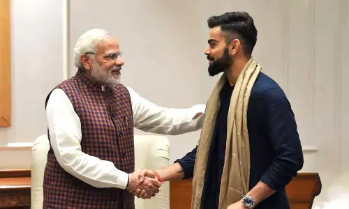 കോഹ്‌ലിയോ മോദിയോ കേമൻ? ട്വിറ്ററിൽ ഫാൻസ് തമ്മിൽത്തല്ല്