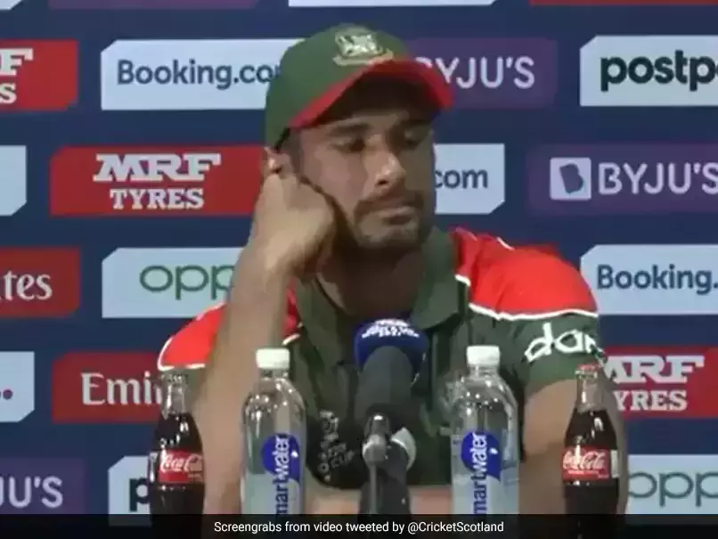 ഒന്ന് ജയിച്ചതിനാണോ: സ്‌കോട്ട്‌ലാൻഡ് കളിക്കാരുടെ ആഘോഷത്തിനിടെ വാർത്താസമ്മേളനം നിർത്തി ബംഗ്ലാദേശ് നായകൻ