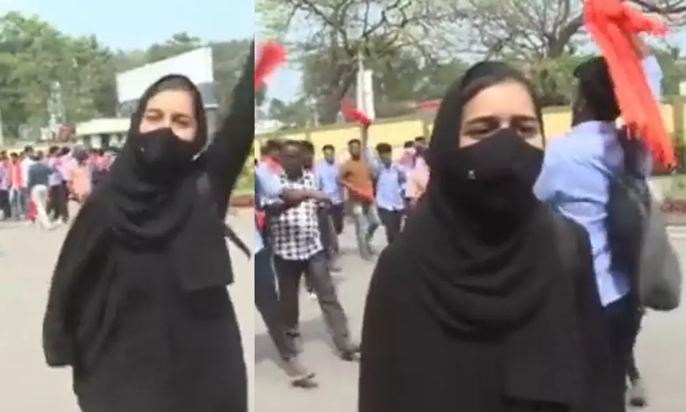 സംഘ്പരിവാർ മുദ്രാവാക്യങ്ങൾക്കിടയിലൂടെ, ഒറ്റയ്ക്ക് ഹിജാബ് ധരിച്ചൊരു പെൺകുട്ടി