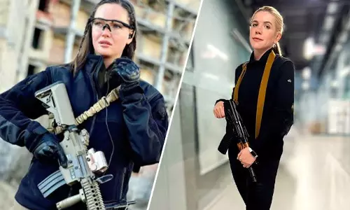 എം.പി മുതൽ ബ്യൂട്ടി ക്യൂൻ വരെ;റഷ്യക്കെതിരെ ആയുധമേന്തി യുക്രൈൻ വനിതകൾ