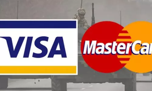 റഷ്യയിലെ സേവനം നിർത്തിവെച്ച് വിസ, മാസ്റ്റർ കാർഡുകൾ