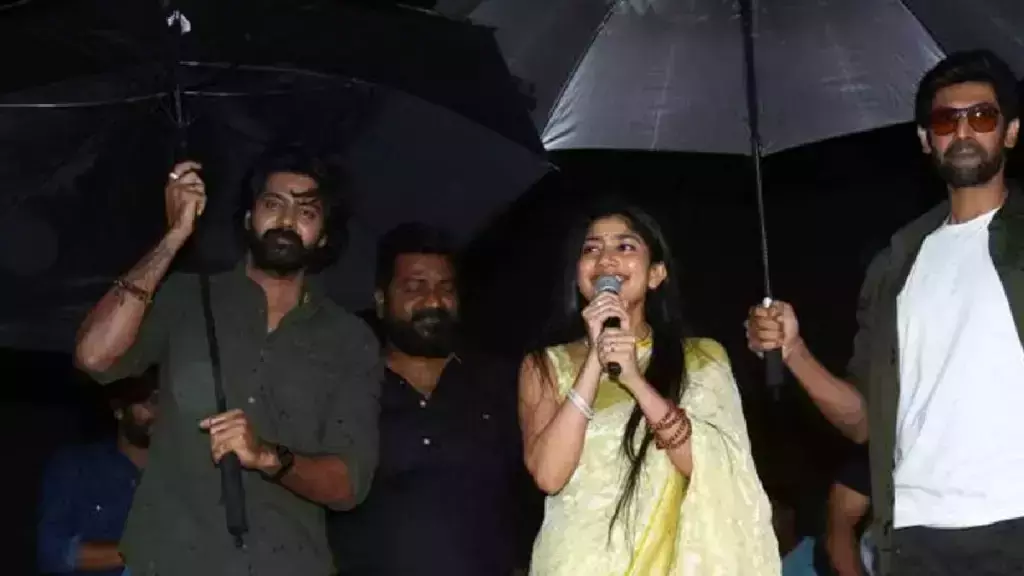 കനത്ത മഴയിലും ആരാധകരെ ആവേശത്തിലാഴ്ത്തി സായ് പല്ലവി, കുട പിടിച്ച് റാണാ ദഗുബതി; വീഡിയോ