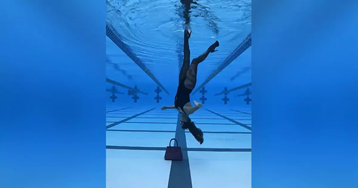 നീന്തല്‍ക്കുളത്തില്‍ തലകീഴായി നടന്ന് യുവതി; വിഡിയോ വൈറല്‍