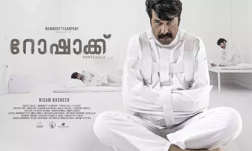 വൈറ്റ് റൂമിൽ കൈകാലുകൾ ബന്ധിച്ച് മമ്മൂട്ടി; നിഗൂഢത നിറച്ച് റോഷാക്ക് പോസ്റ്റർ