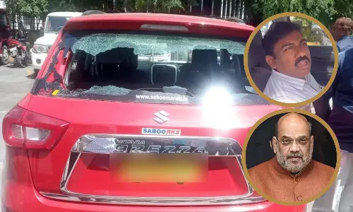 അമിത് ഷായുടെ റാലിക്കിടെ ബിജെപിക്കാർ തന്റെ കാർ തകർത്തതായി ‌ടി.ആർ.എസ് നേതാവ്