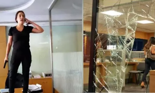 സഹോദരിയെ ചികിത്സിക്കണം; സ്വന്തം അക്കൗണ്ടിലെ പണം പിൻവലിക്കാൻ കളിത്തോക്കുമായി ബാങ്ക് കവർച്ച നടത്തി യുവതി