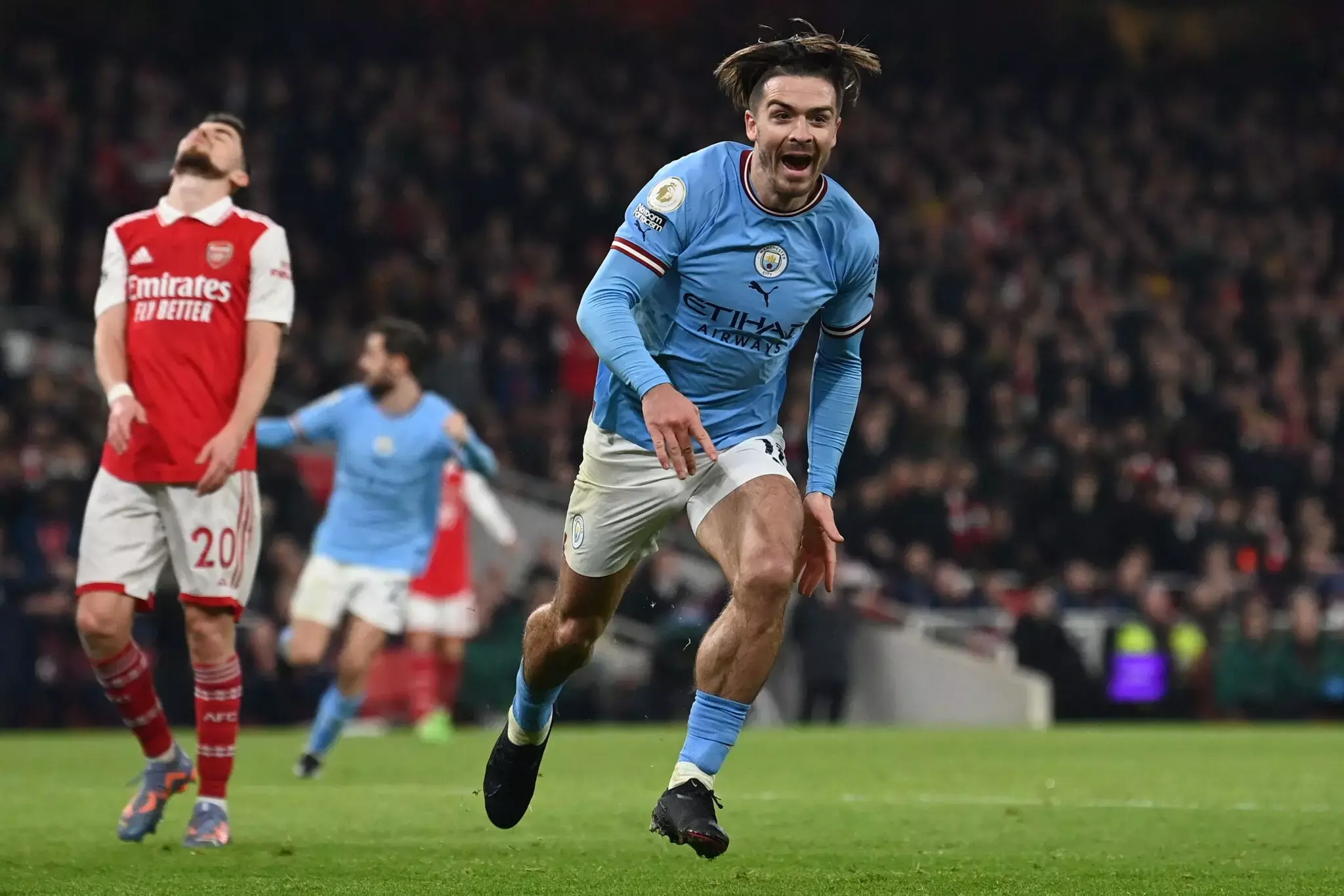 Jack Grealish’s second-half goal restored Manchester City’s lead at Arsenal