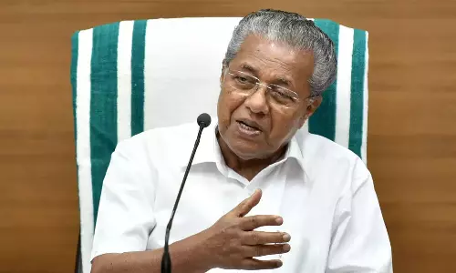 Heavy security,  Chief Minister,  land,  backwaters,