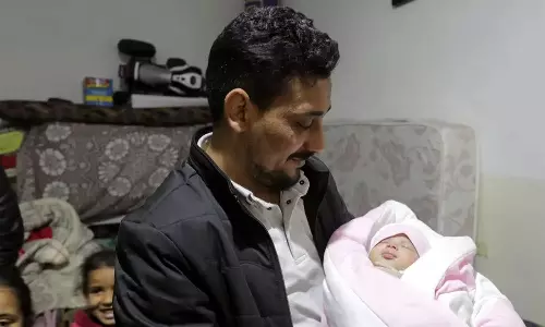 Miracle baby gets adopted by uncle and aunt