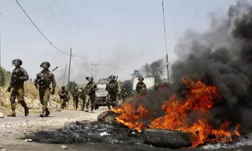 Israel bombs Gaza after rocket fire, deadly Nablus raid