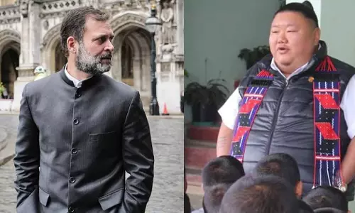 Confidence pose next level Nagaland BJP Chief  Temjen Imna Along praises Rahul Gandhi