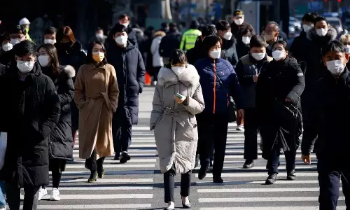 South Korea U-turns on 69-hour working week after youth backlash