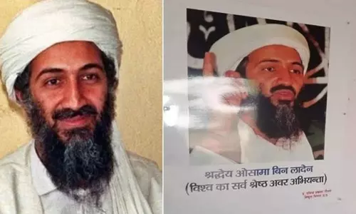 UP man fired for putting bin ladens picture in office wall