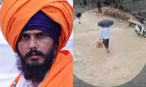 Khalistani Leader Amritpal Singh In Haryana, Uses Umbrella To Hide Face From CCTV,