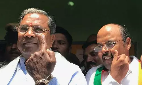 karnataka election 2023,Yathindra Siddaramaiah on  karnataka election 2023,breaking news malayalamമത്സരിക്കാനില്ല, പിതാവിന് വേണ്ടി വോട്ട് തേടുകയാണ് ദൗത്യം; യതീന്ദ്ര സിദ്ധരാമയ്യ,കര്‍ണാടക തെരഞ്ഞെടുപ്പ്,
