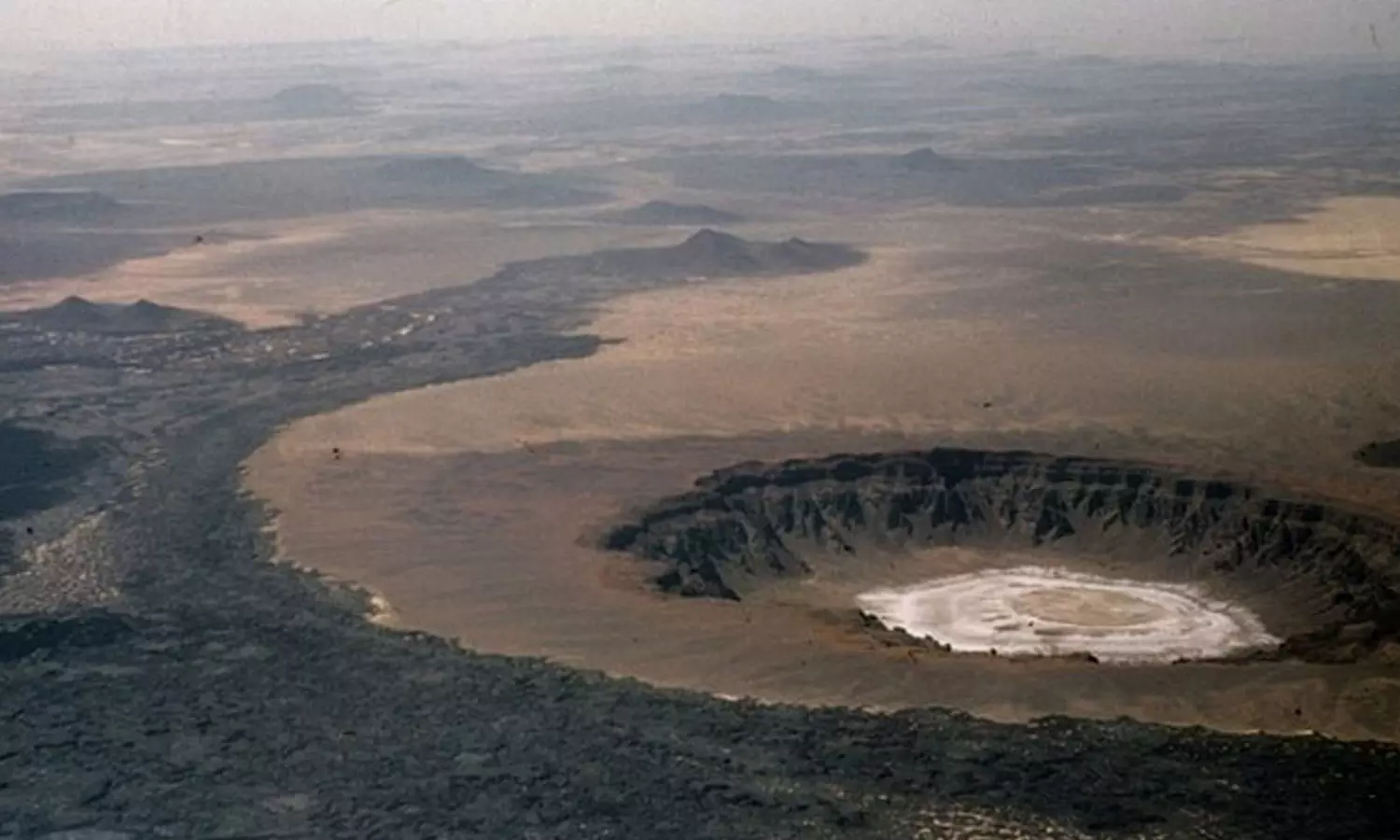 Saudi Arabia has a total of  1256 craters