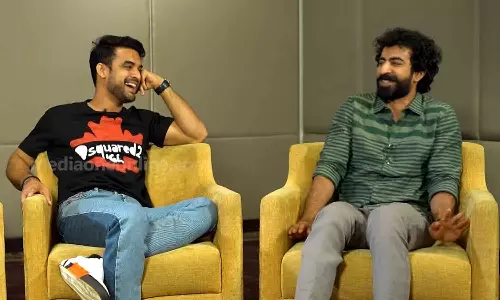 Tovino Thomas and Roshan Mathew having a fun moment in the middle of MediaOne interview