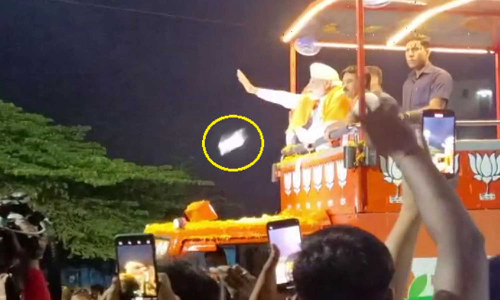 MobilephonethrownatModi, MobilephonethrowntowardsNarendraModi, NarendraModiMobilephonemishapatroadshowinKarnataka, Karnatakaassemblyelection2023