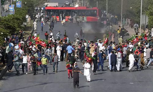 Imran Khan arrest violence in Pakistan, RSS and the BJP in Pakistan violence, Pakistan Prime Ministers special assistant, Pak PM Shehbaz Sharif, Attaullah Tarar