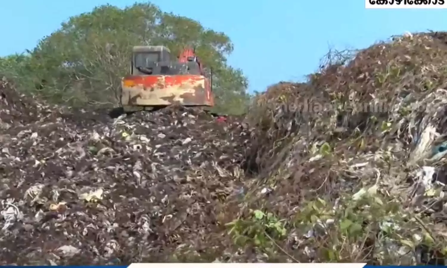 njeliyan Parambu waste; zonda  company wants to extend the contract,latest malayalam news,ഞെളിയൻ പറമ്പിലെ മാലിന്യ നീക്കം; കരാർ നീട്ടി നൽകണമെന്ന് സോണ്ട കമ്പനി