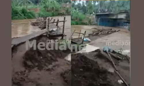 A temporary bridge was washed away at Tiruvambadi in heavy rain