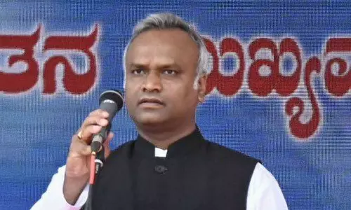 Why dont children of politicians wear saffron shawls? Priyank Kharge Why dont children of politicians wear saffron shawls? Priyank Kharge