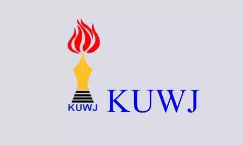 kuwj against police raid in Jornalists home