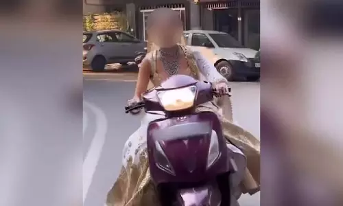 Bride rides a scooter
