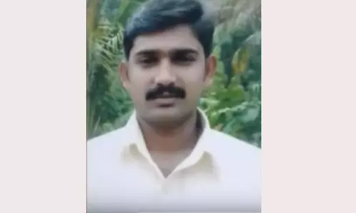 young man died after falling from a tree in Idukki
