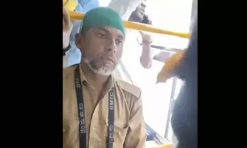 woman forces bus conductor to remove skull cap