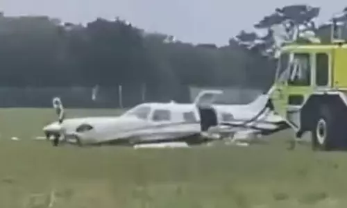 The pilot experienced physical distress; The passenger took control of the plane