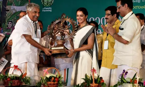 manju warrier oommen chandy