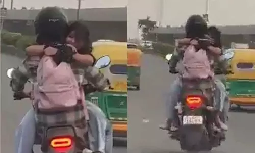 A couple hugging while riding a bike; Delhi traffic police imposed a fine of Rs 11,000