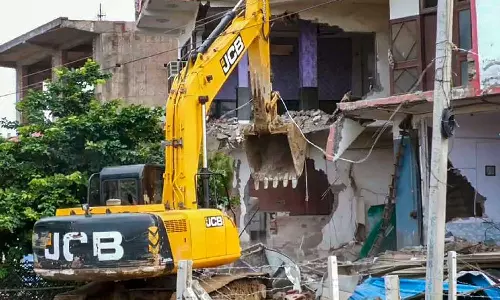 Sahara Hotel in Haryanas Nuh demolished by bulldozers, Sahara Hotel in Haryanas Nuh bulldozed, bulldozer raj in Haryana Nuh, Nuh violence, Haryana clashes Sahara Hotel in Haryanas Nuh demolished by bulldozers, Sahara Hotel in Haryanas Nuh bulldozed, bulldozer raj in Haryana Nuh, Nuh violence, Haryana clashes