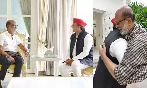 Akhilesh Yadav hugs Rajani kanth