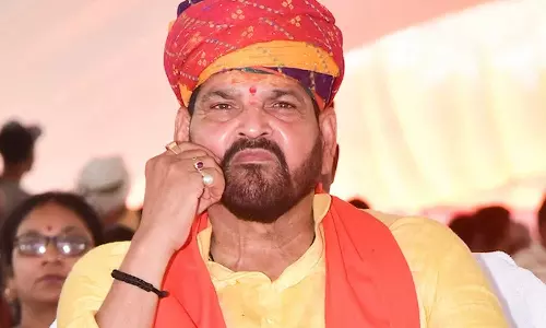 World wrestling body suspends WFI, Indian wrestlers can’t play under India flag at Championshipsm, UWW suspends WFI for delaying elections, Wrestling Federation of India membership suspended, Wrestling Federation of India, WFI, UWW, brij bhushan singh case, wrestlers protest,