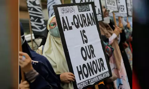 Denmark law making against quran burning