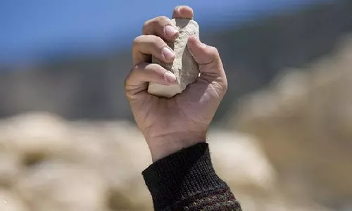 Woman stoned to death