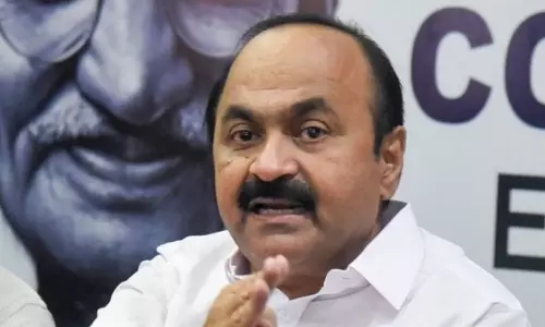 VD Satheesan against Thomas isaac on economic crisis