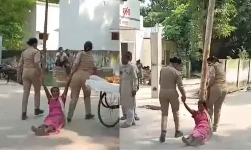 Woman dragged on road by UP cops outside police station, latest national news