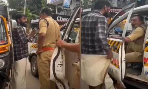 In Kannur, two people were arrested for questioning the Kerala police for not wearing seat belts