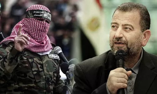 Hamas Vice President Saleh Al-Aruri and Issuddin Qassam Brigade Spokesman Abu Obaida describe the Hamas Vice President Saleh Al-Aruri and Issuddin Qassam Brigade Spokesman Abu Obaida describe the