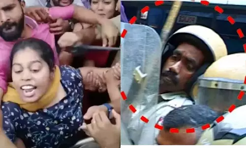 KSU leader, Nesia Mundapalli, policeman, ksu march, latest malayalam news, KSU നേതാവ്, നെസിയ മുണ്ടപ്പള്ളി, പോലീസുകാരൻ, കെ.എസ്.യു, ഏറ്റവും പുതിയമലയാളം വാർത്ത